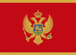 [ai] The flag of Montenegro featuring a red background, a golden border, and a double-headed eagle in gold with a shield on its chest displaying a lion, a crown above the eagle, and a scepter and orb in its claws.